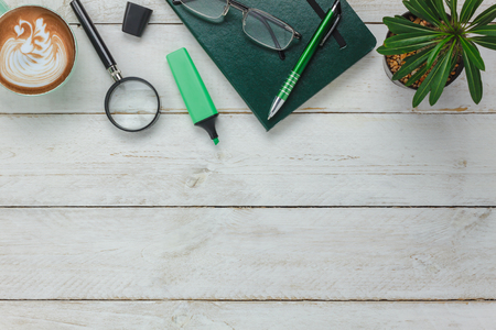 Top table of business office desk background concept. Mix essential items on white modern wooden. Empty space for creative design text or word.の写真素材
