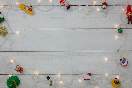 Top view of decoration Happy New year and Merry Christmas background.Mix variety essential of accessory for season.Different object on modern rustic white wood office desk.space for creative word.の写真素材