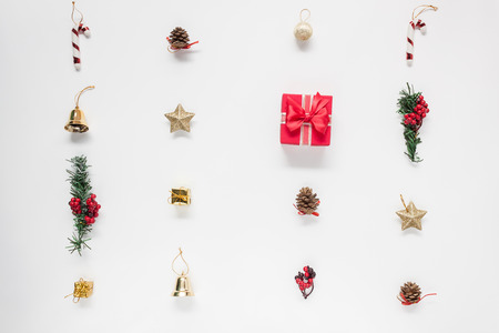 Flat lay aerial image of accessories Merry Christmas & Happy new year white background concept.Essential beautiful decorations & ornaments arrangement on backdrop.Items for the winter season.の写真素材