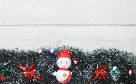 Table top view image of decorations Merry Christmas & Happy New Year background concept.Many accessories items and ornaments decor seasonal on modern rustic white wooden at home office desk studio.の写真素材