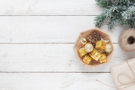 Table top view aerial image of accessories to travel on Merry Christmas & Happy New Year trip background concept.All object on modern rustic white wooden at home office desk studio.Free space for textの写真素材