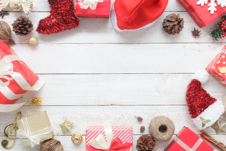Above view of image item Merry Christmas & Happy New Year decor festival background concept.free space for creative design.Essential decorations on modern rustic white wood at home office desk studio.の写真素材