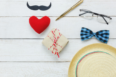 Table Top view image accessories Happy Fathers day background concept.Flat lay object sign of festive for dad travel on modern rustic white wooden at home office desk.Free space for creative design.の写真素材