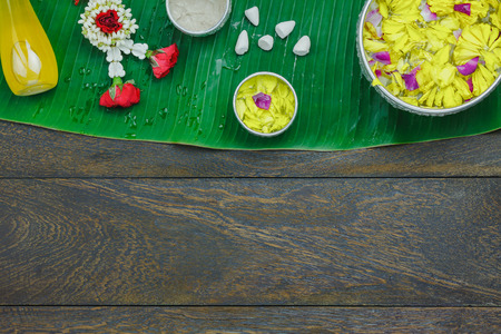 Table top view decoration & sign on Songkran festival or Thailand new year holiday background concept.Flat lay essential object for traditional respect older parent  in the season.Arrangement on wood.の写真素材