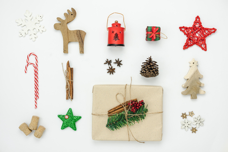 Table top view of Merry Christmas decorations & Happy new year ornaments concept.Flat lay essential difference objects decor reindeer & gift box and other decor on modern white wooden  background.の写真素材