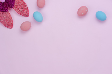 Table top view shot of decorations Happy Easter holiday background concept.Flat lay colorful eggs...