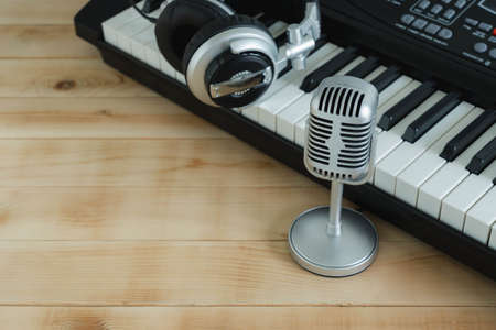 Music instrument tools concept background. Close up group of musical tools the silver michophone,...