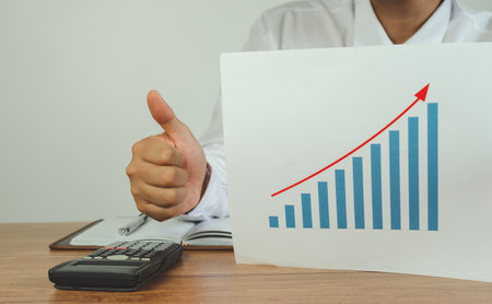 Businessman show growth up of strategy financial indicator and accounting market economy analysis chart.business finance and investment concept. Stock Market Investments.Increase of rise organization.の写真素材