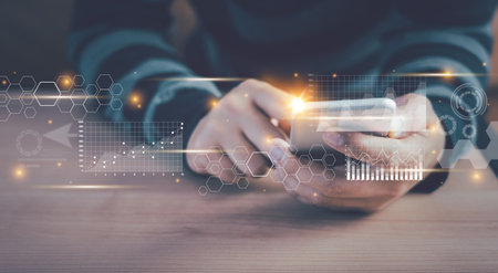 Human using mobile phone technology for digital marketing of statistics level up of graph. business management  goal strategy and action plan. Global customer network connection  on virtual interface.の写真素材