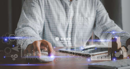 Human using computer technology for digital marketing of statistics level up of graph. business...