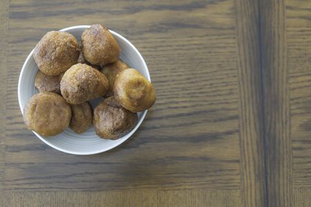 Nigerian Snack Puff Puff in White Bowl with space for copy