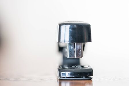Stapler on Brown Tableの写真素材