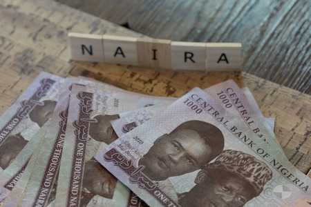 Nigerian Naira Notes spelled with tilesの写真素材