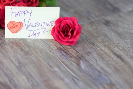 Happy Valentine's Sticky Note with rosesの写真素材