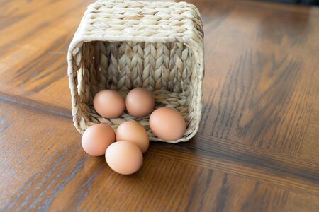 Eggs in Basket with Croissant to make  breakfastの写真素材
