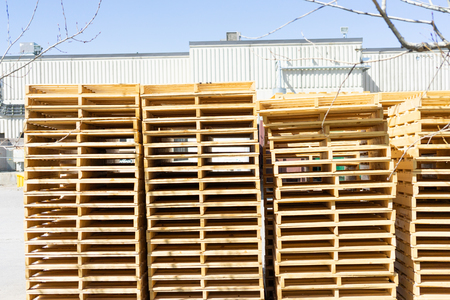 Stack of Wooden Pallets outside Factory