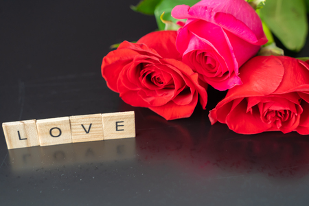 fresh cut roses for valantines day - Romantic Concept on black backgroundの写真素材