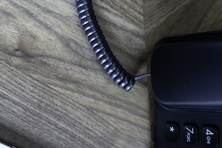 Office Telephone console on wood tableの写真素材