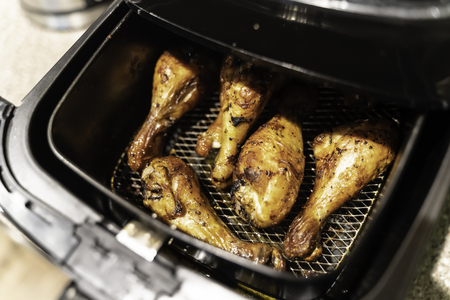 Grilled chicken thighs in non fat fryerの写真素材