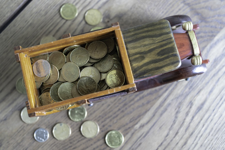 Truck carrying coins on way to bankの写真素材