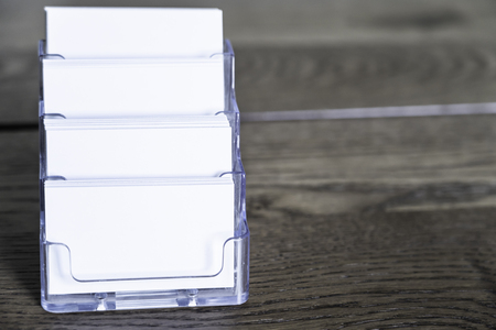 blank business card in a business card rackの写真素材
