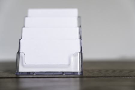 blank business card in a business card rackの写真素材