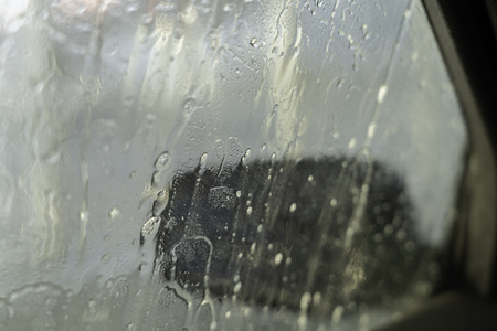 Car Passing through car wash at gas station