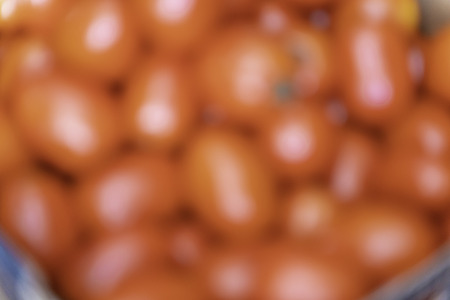 Box of tomatoes blurred backgrounds with copy spaceの写真素材