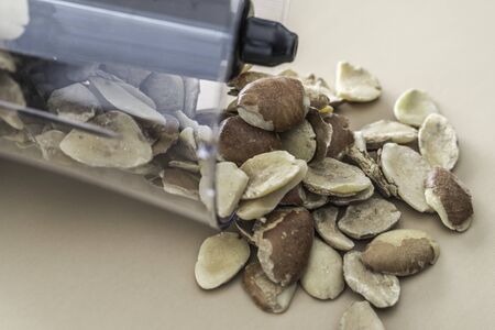 Nigerian ogbono seed in grinder to prepare traditional nigerian soup
