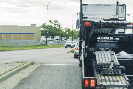 Motor Vehicle car transporter at road intersectionの写真素材