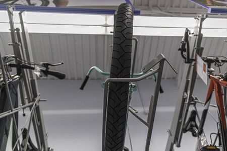 Bicycle tire on display in a bike shop to sell