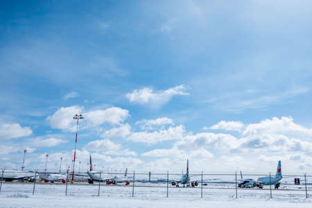 April 11 2020 - Calgary , Alberta, Canada - Airliners parked at the Calgary International Airport - Covid-19 Pandemicのeditorial素材