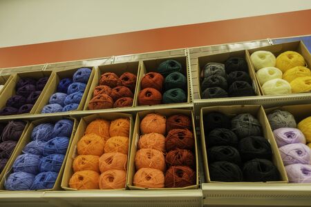 Balls of Wool Yarn - Various colors in a boxの写真素材
