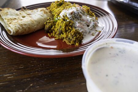 Lamb Biryani with Nann Bread and Yogurtの写真素材
