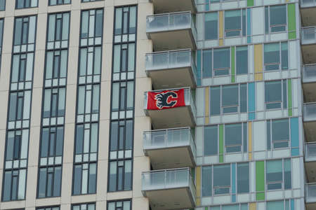 September 5 2020 - Calgary Alberta Canada - Calgary Flames Flag on Aprtment balconyのeditorial素材