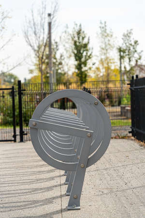 Empty bicycle rack in a public parkの写真素材