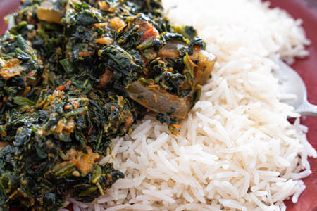 Just cooked Nigerian Spicy vegetable Spinach Soup ready to eat with rice