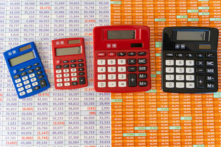 Collection of Calculators on a spreadsheet background - Financial Conceptの写真素材