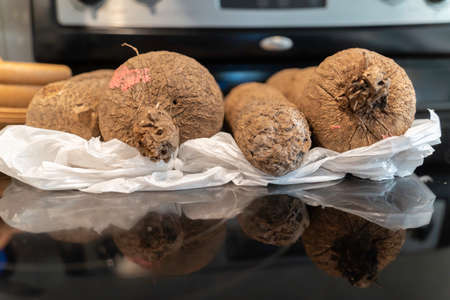 Pile of Nigerian African Yam tubers in a kitchen