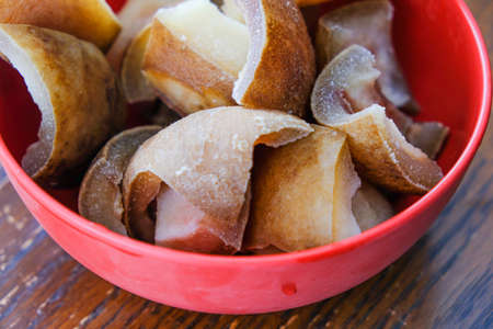 Nigerian Cowskin Ponmo in Red bowl to make stewの写真素材