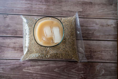 Kununzaki a traditional Nigerain refreshment Drink with bag of millet