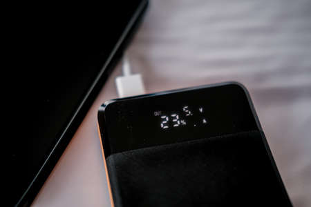 Portable power bank to charge phones and tabletsの写真素材