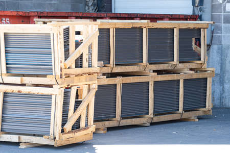 Roofing sheets in crate for delivery to client