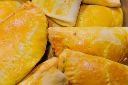 Pile of Nigerian meat pies ready to eat