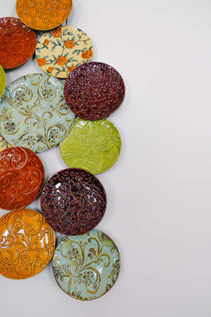 Round Circular plates arranged display on a wall