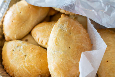 Nigerian Meat pies snack freshly baked in kitchenの写真素材