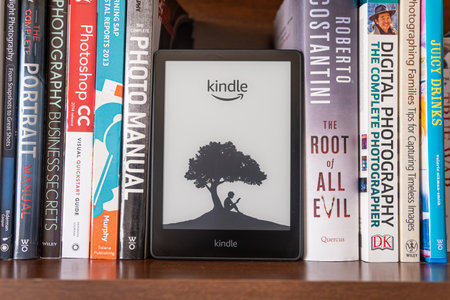 1 July 2022 - Calgary, Alberta Canada - Amazon kindle tablet for reading books.のeditorial素材