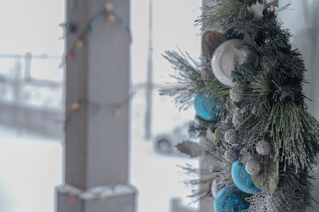 Christmas wreath decoration on open door of a houseの写真素材