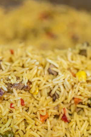 Pot of Nigerian fried vegetable rice to eatの写真素材