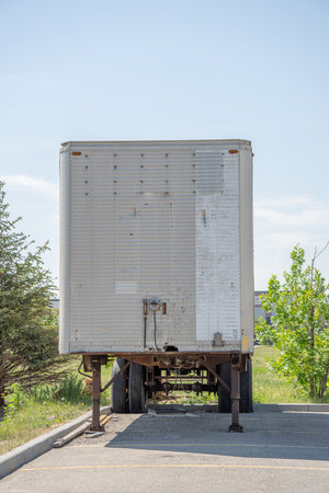 Diconnected trailer in city parking lotの写真素材